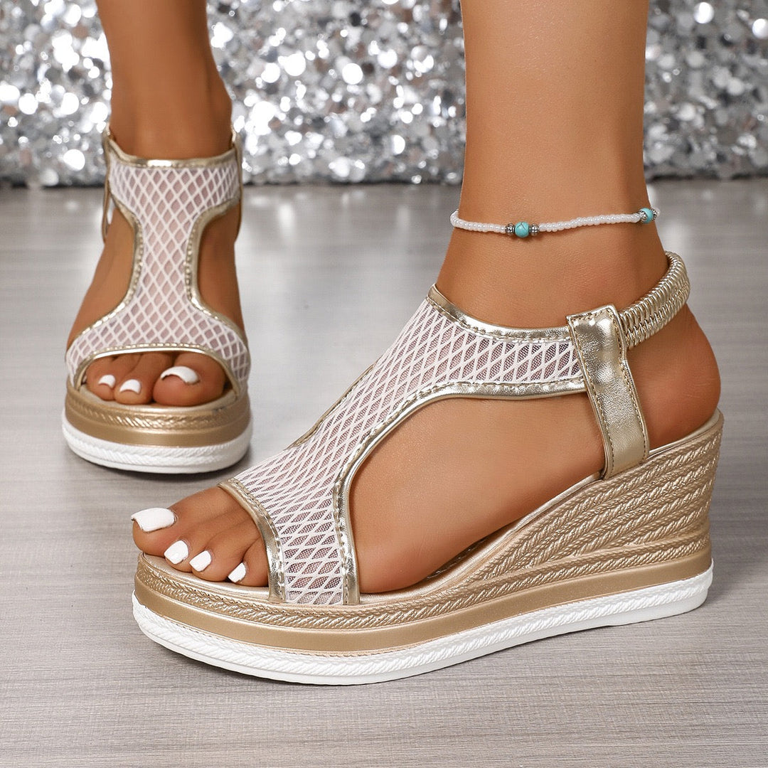 White mesh wedge sandals with gold ankle strap and open toe platform sole