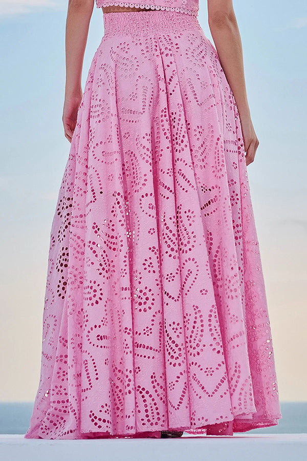 Pink high-waist maxi skirt with allover eyelet embroidery and flowing A-line flare