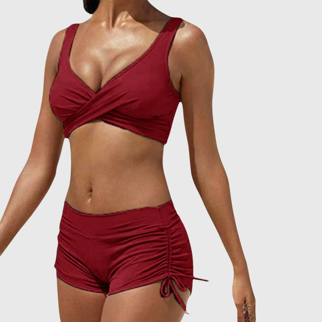 Red bikini set with V-neck wrap bra and ruched side-drawstring swim shorts
