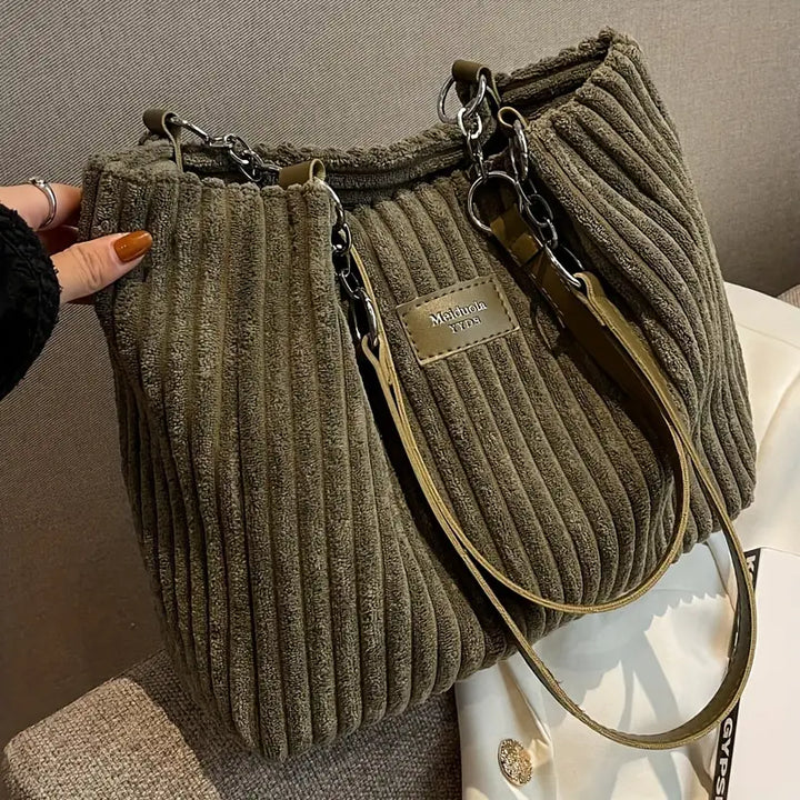 Large capacity corduroy tote bag in olive green with top zipper and crossbody strap