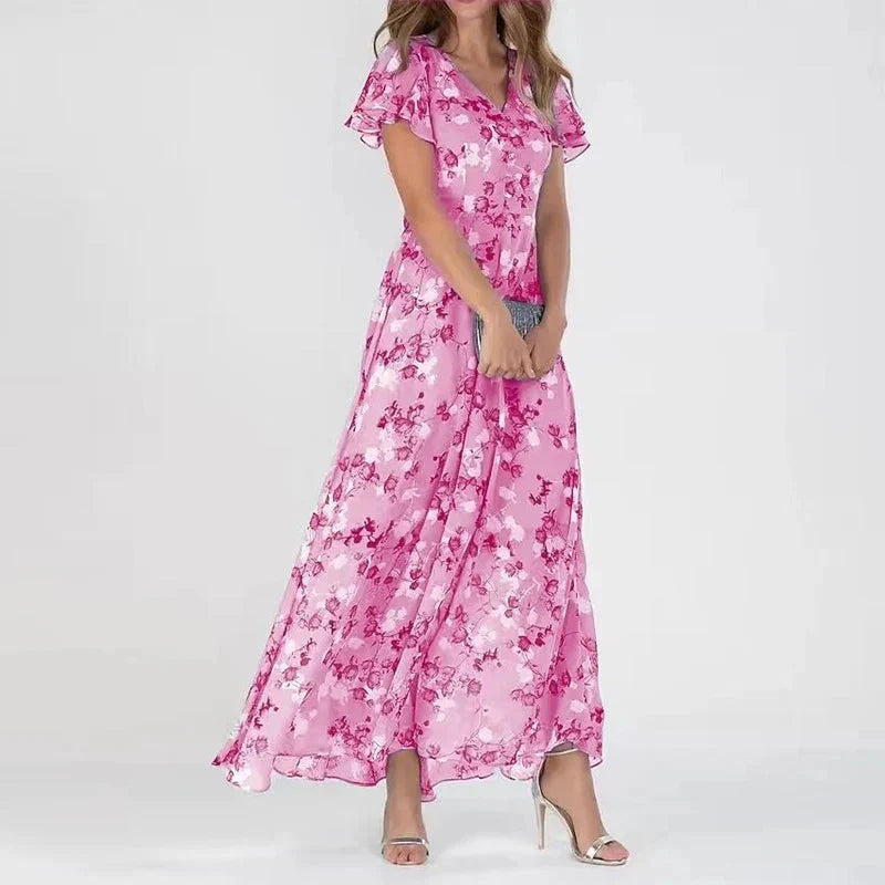 Pink floral V-neck midi dress with flutter sleeves and pleated skirt hem
