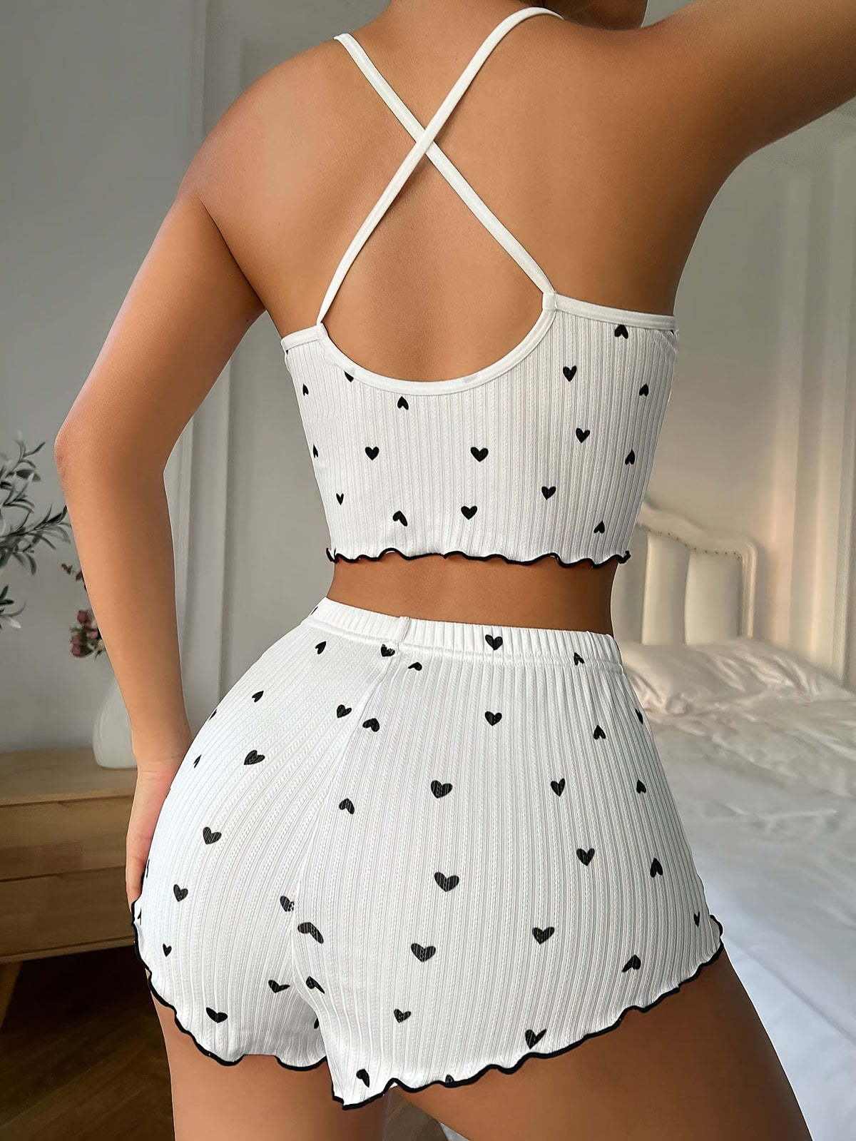 White heart-print pajama set with ruffle trim, crisscross back straps and matching shorts