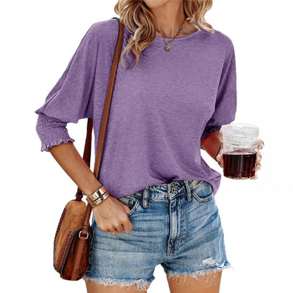 Purple lightweight short-sleeve blouse with gathered cuffs and relaxed fit