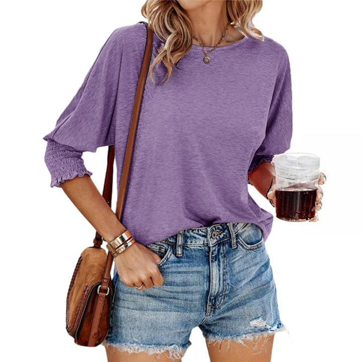 Purple lightweight short-sleeve blouse with gathered cuffs and relaxed fit
