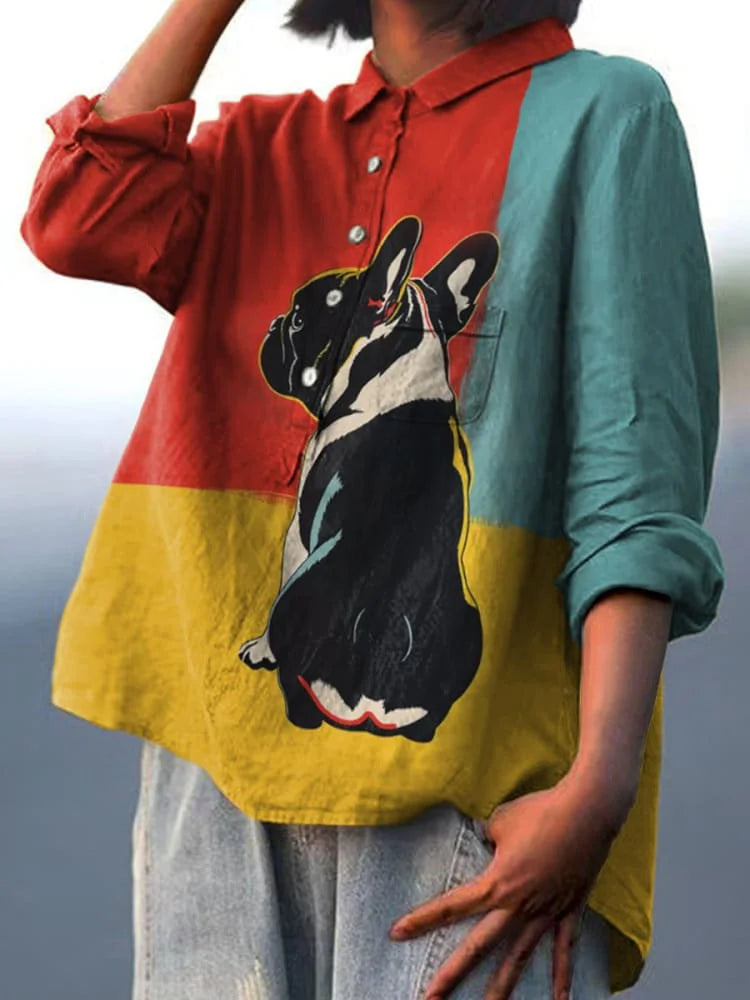 Long sleeve button-up shirt with dog print on front, red yellow teal color blocks
