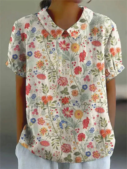 Women’s vintage floral print shirt, white with multicolor flowers, V-neck and short sleeves