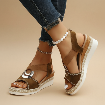 Brown platform espadrille sandals with toe strap, ankle strap, and metallic ring