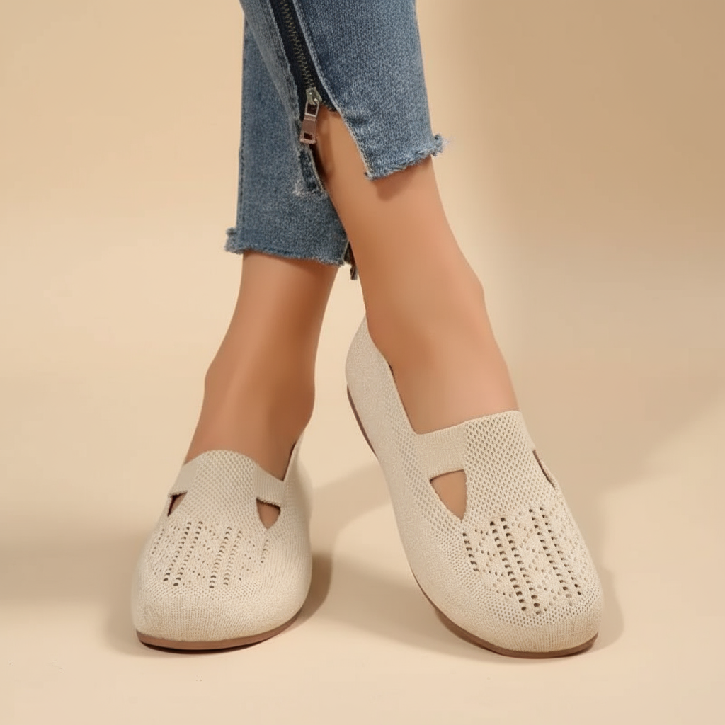 Cream knit ergonomic sandals with side cutouts and slip-on fit