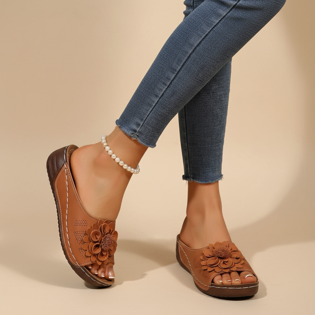 Ergonomic sandals in brown with pearl ankle strap and layered flower appliques