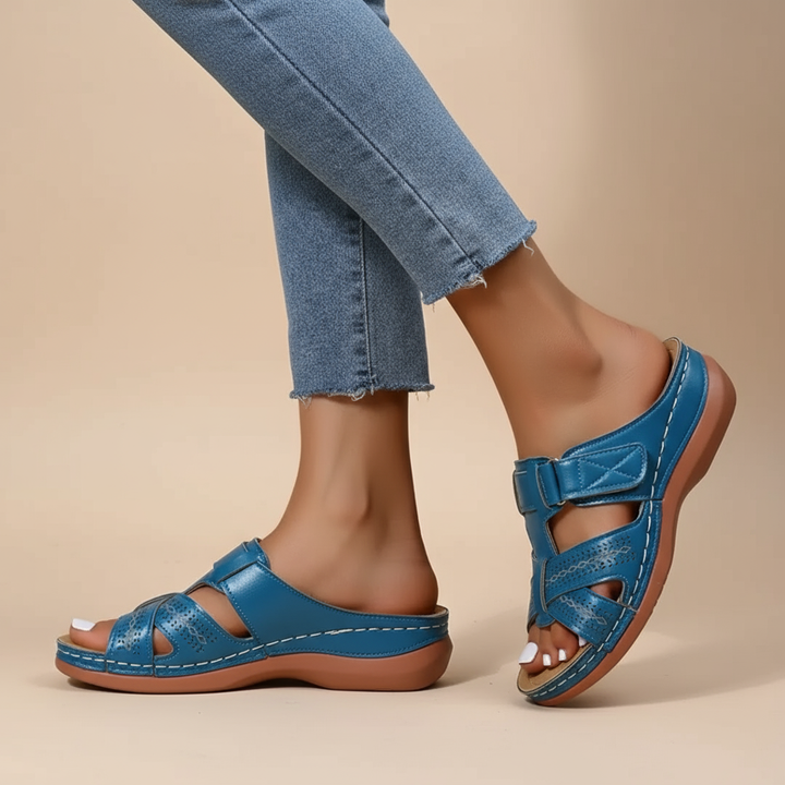 Vivian blue ergonomic sandals with ankle strap and perforated toe panels, cushioned sole