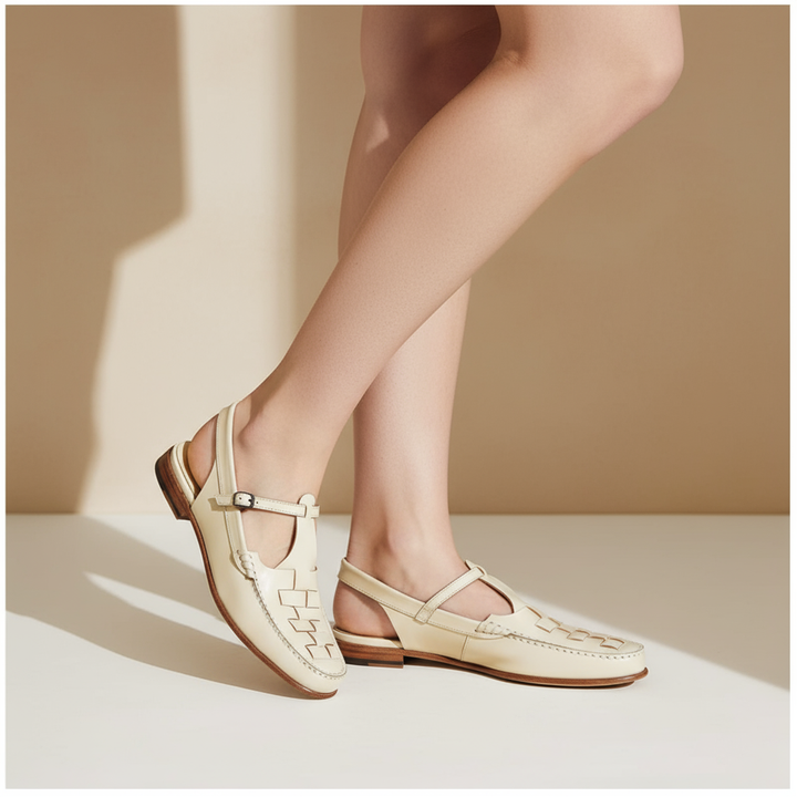 Ivory woven charm sandals with T-strap and buckle, side view, low block heel