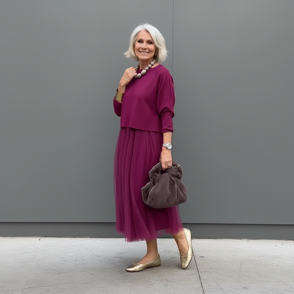 Fuchsia knit layered dress set with three-quarter sleeves and tulle midi skirt