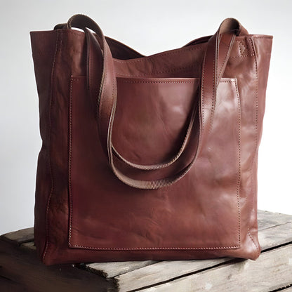 Aria™ leather tote bag with wide double handles, front panel, visible seam stitching