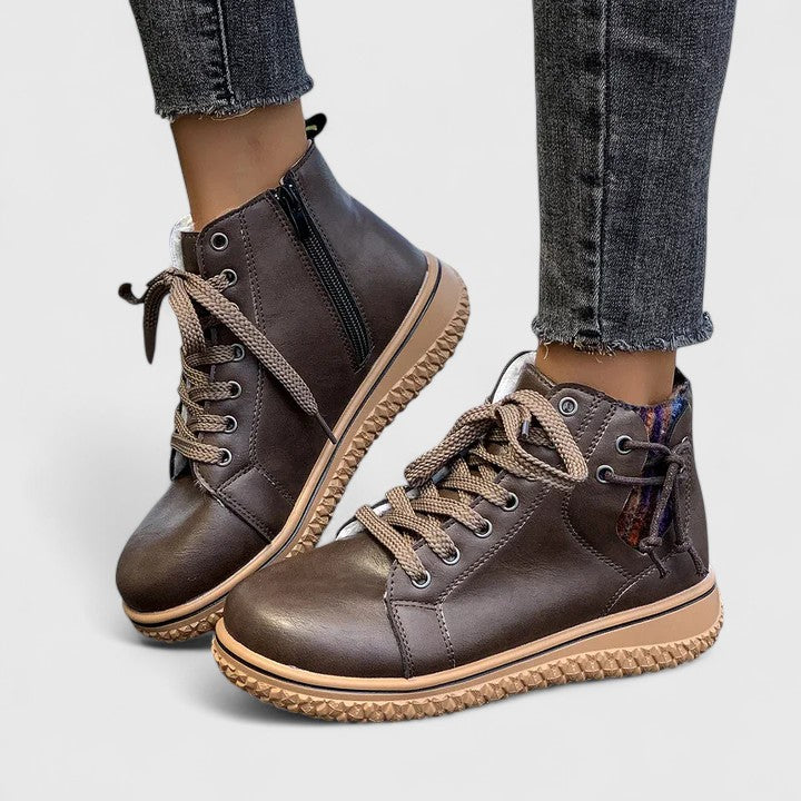 Dark brown high-cut orthopedic sneakers with lace-up and side zipper, tan sole