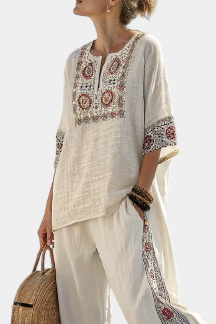 Embroidered linen blouse with three-quarter sleeves and matching wide-leg trousers