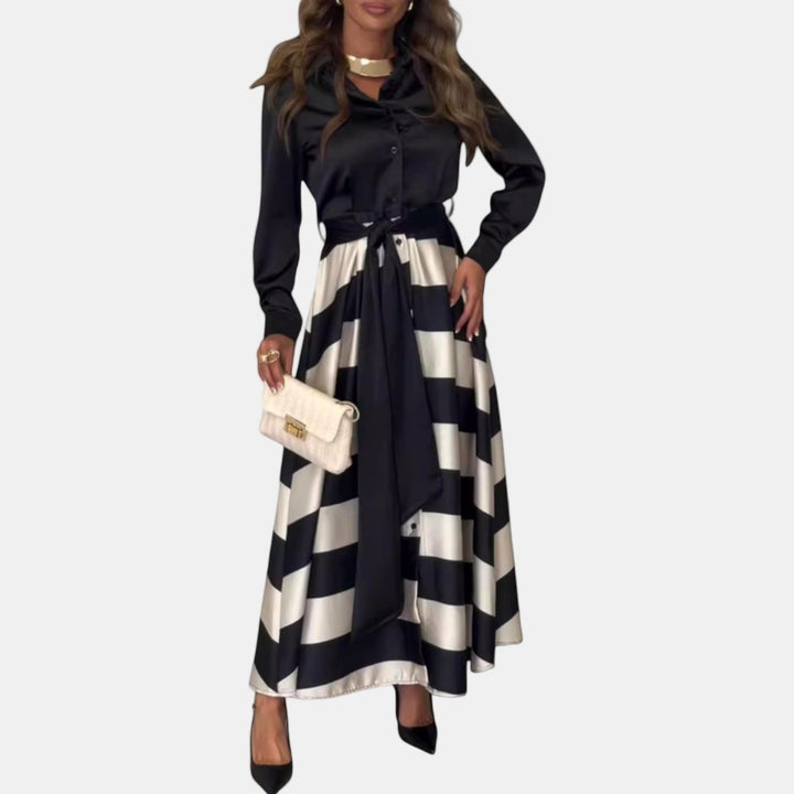 Black and cream striped dress with tie waist and long sleeves