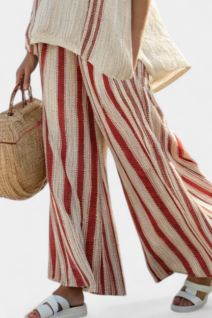 Wide-leg linen trousers with red and cream vertical stripes