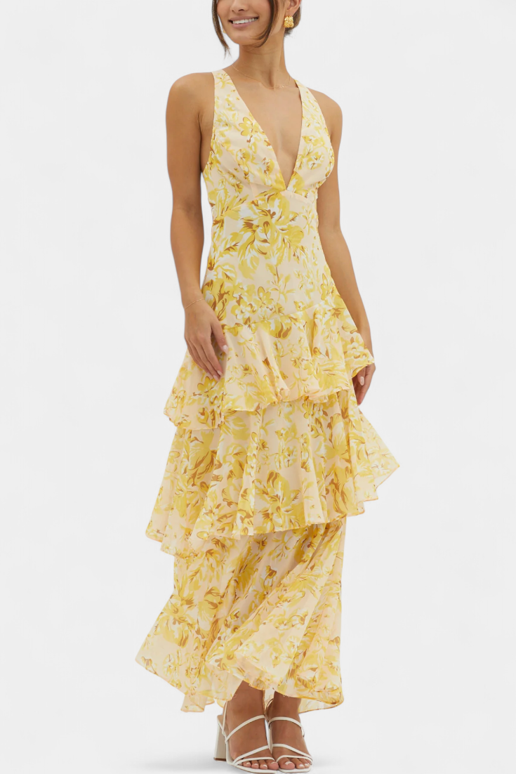 Tiered ruffle dress with plunging V-neck and sleeveless bodice, yellow floral print