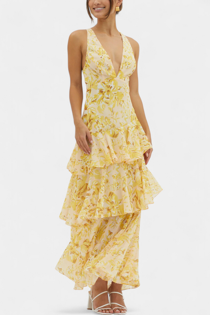 Tiered ruffle dress with plunging V-neck and sleeveless bodice, yellow floral print