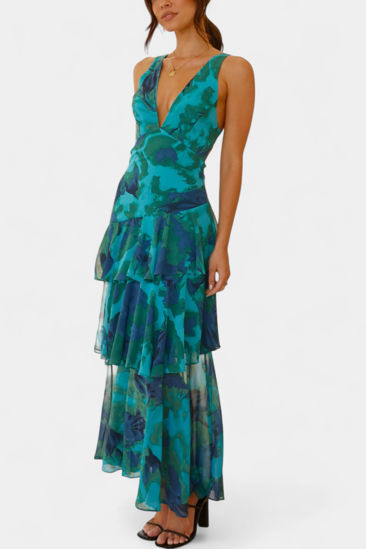 Tiered ruffle dress with V-neck and sleeveless bodice, teal floral print and layered skirt