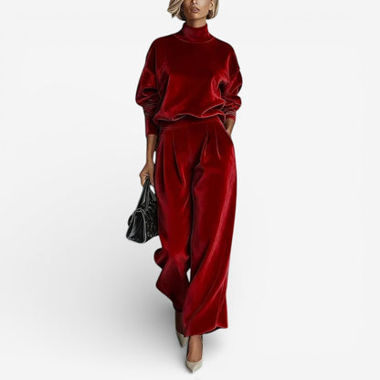 Red velour-look two piece set: mock-neck top and wide-leg trousers