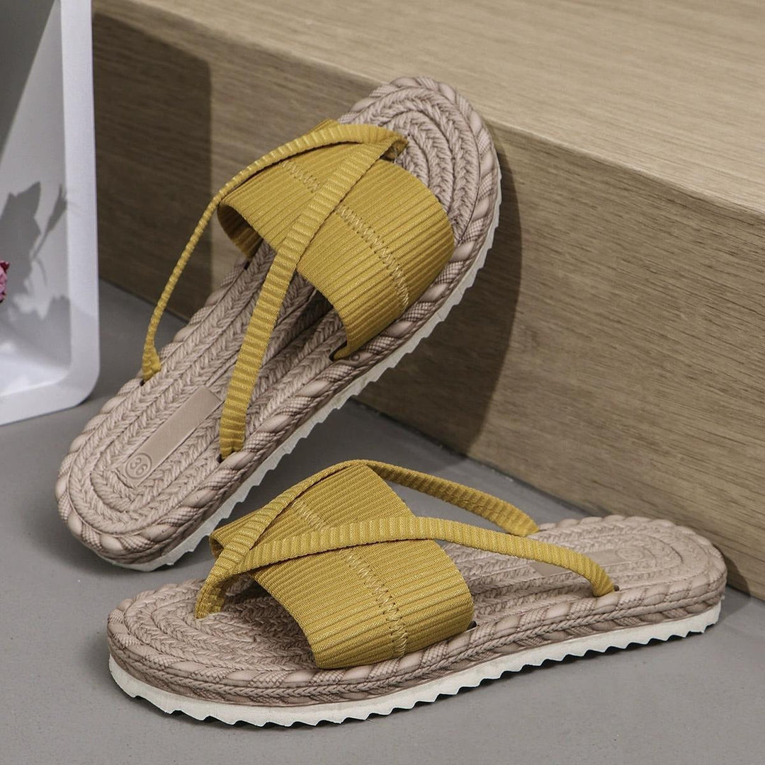 Mustard yellow knit toe-loop slide sandals with braided jute-look sole and textured tread