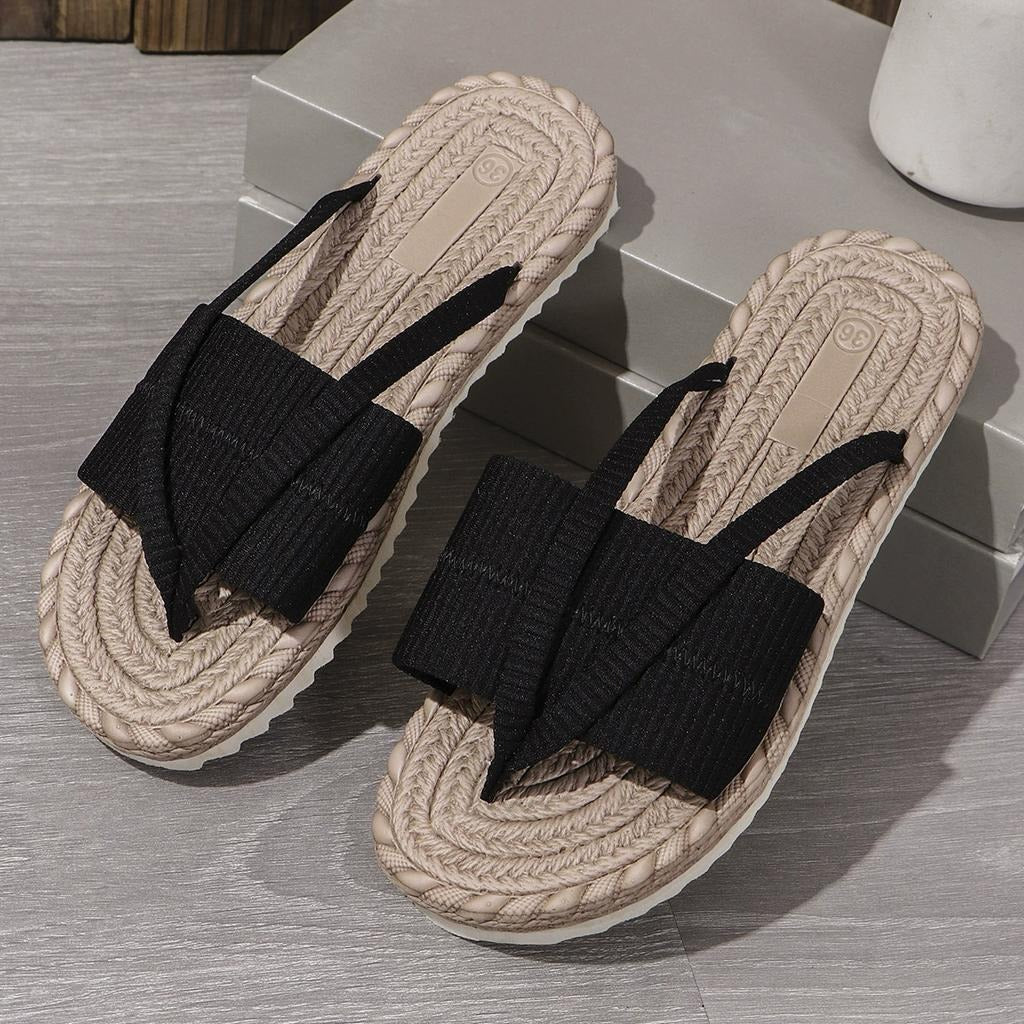 Black knit toe-loop slide sandals with braided jute-look sole and textured tread