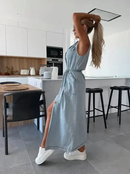 Light blue denim maxi dress with sleeveless back and side slit detail