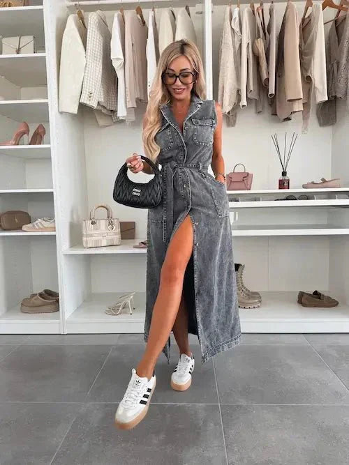 Light blue denim maxi dress with sleeveless collared top and front tie waist