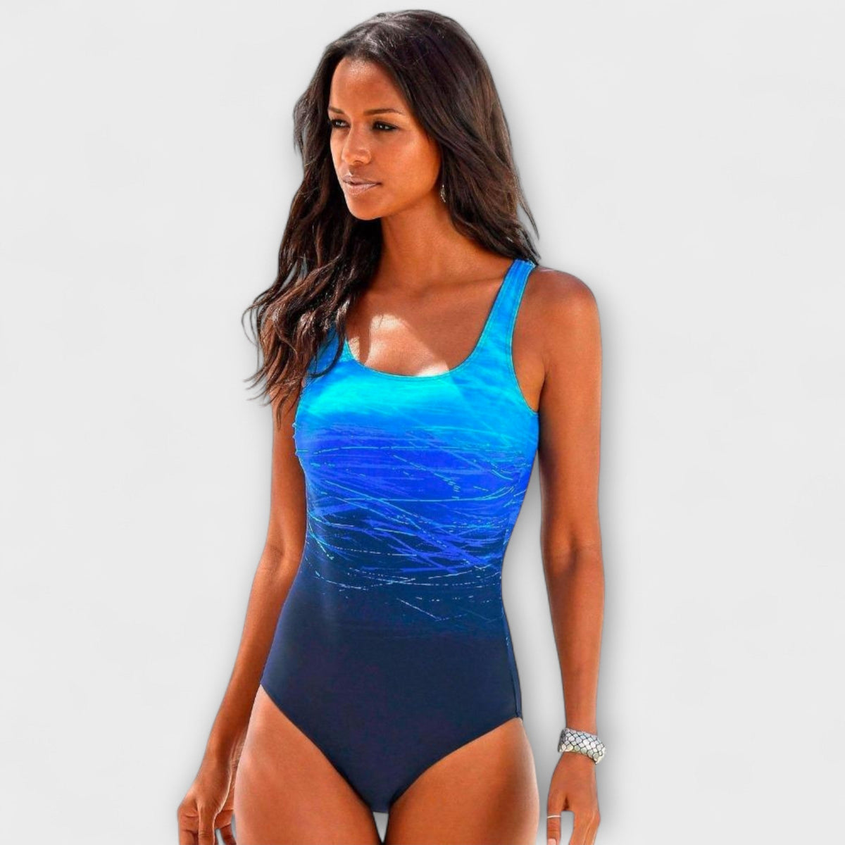 Blue one-piece sport swimsuit, scoop neck, dark navy legs.