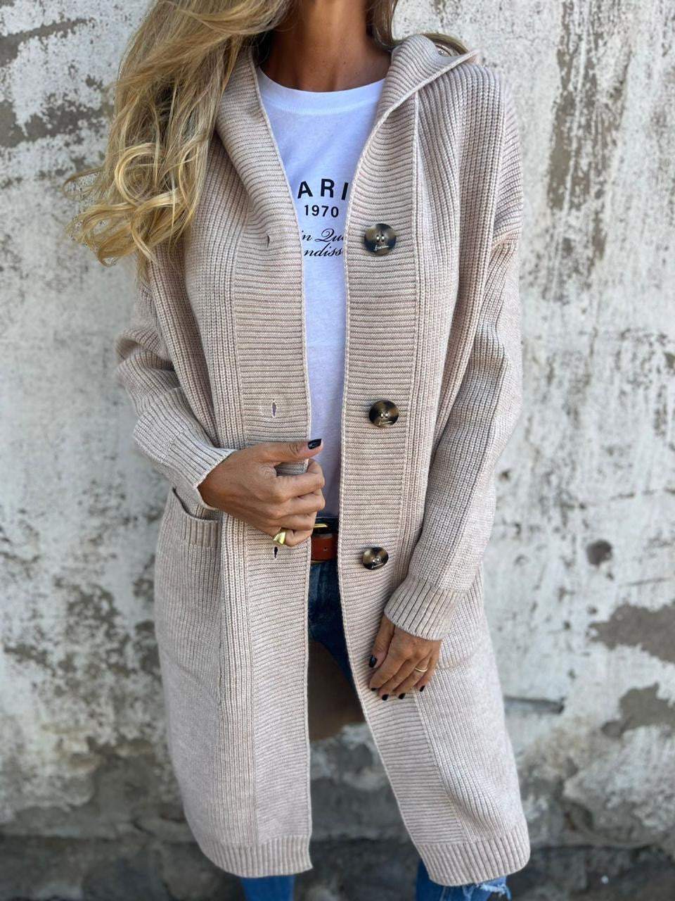 Beige long knit cardigan with hood, ribbed texture, and button front.