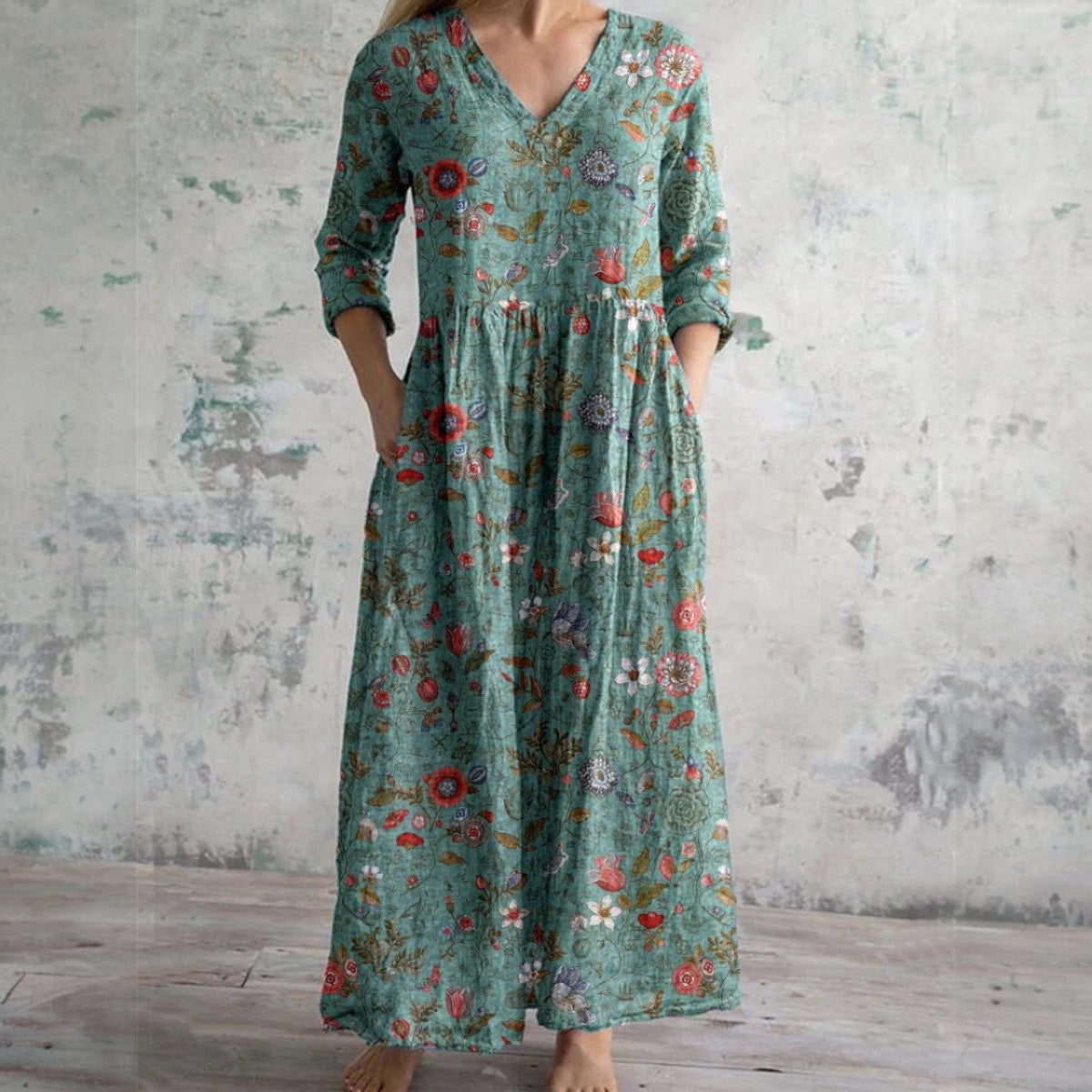 Teal long floral maxi dress with V-neck, 3/4 sleeves, gathered waist, flowing skirt