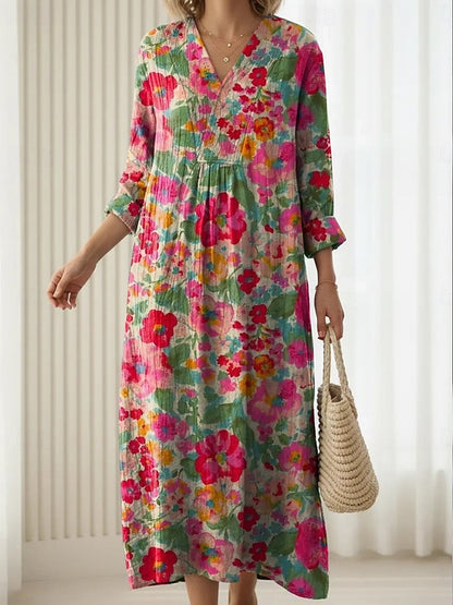 Floral print comfort dress with V-neck, long sleeves, gathered tiered skirt