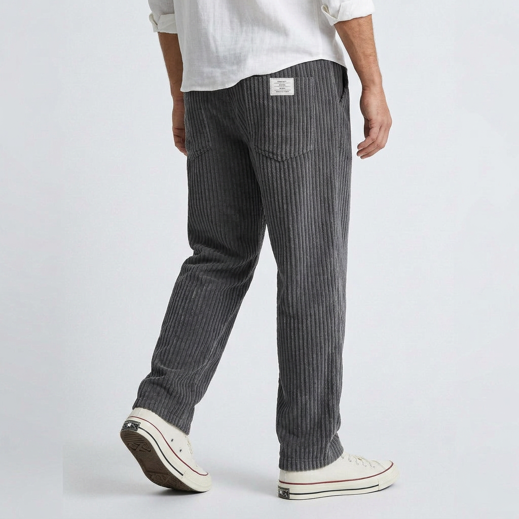 Dark gray wide-leg corduroy pants with vertical ribs and back yoke seam