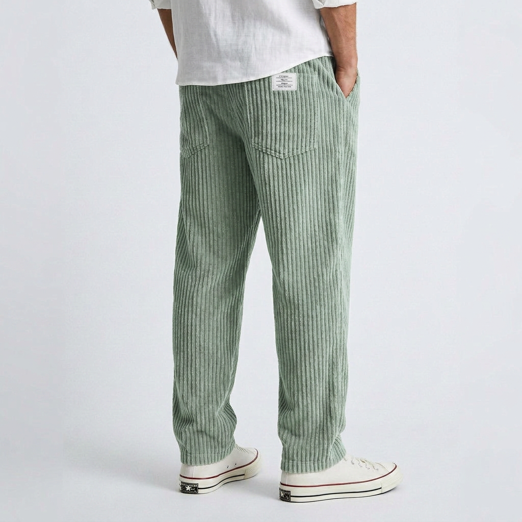 Light green wide corduroy pants with vertical ribs, relaxed fit, ankle length.