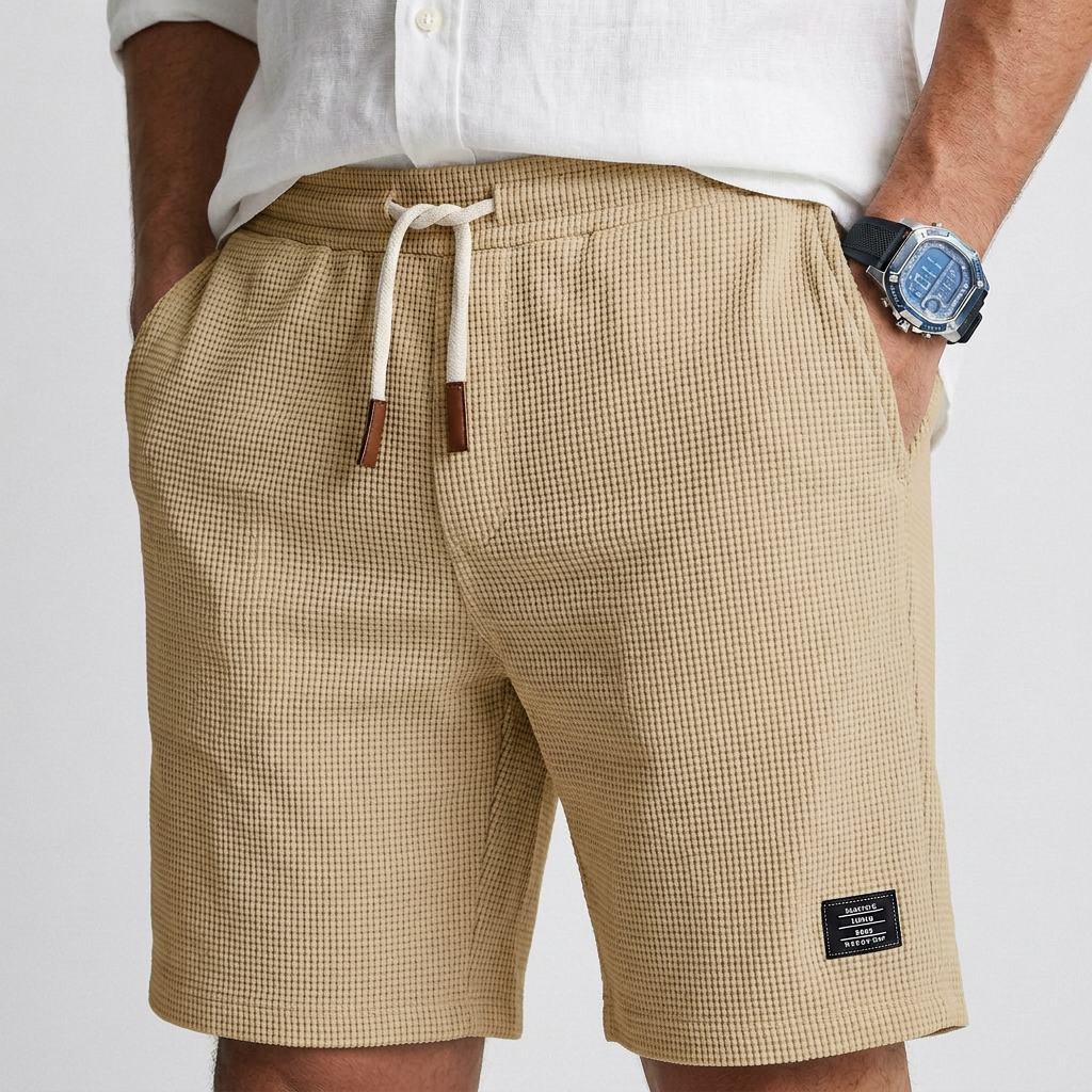 Beige textured knit shorts with drawstring elastic waist and side pockets