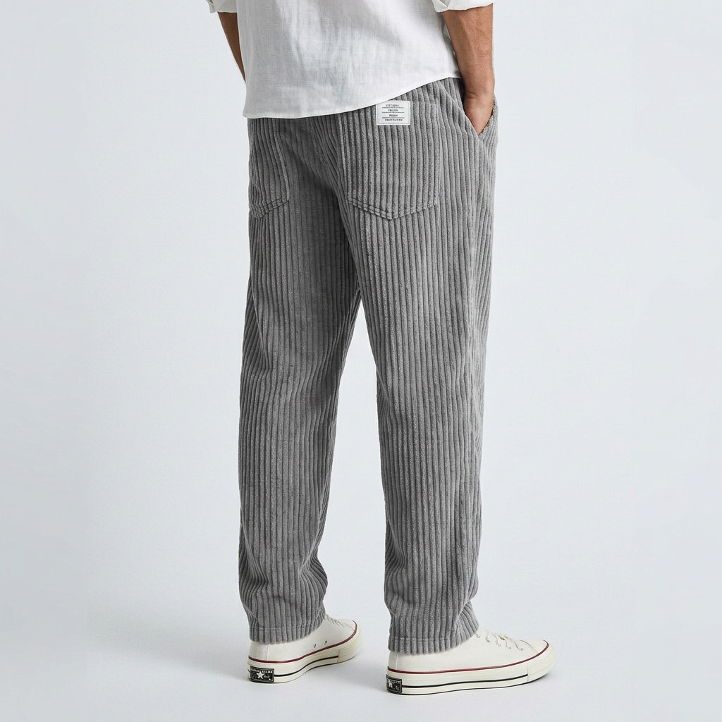 Gray wide-corduroy pants with vertical ribbed texture, relaxed fit and side pockets