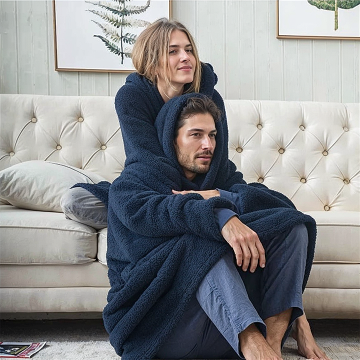 Navy fleece-lined oversized hoodie with hood and front kangaroo pocket.