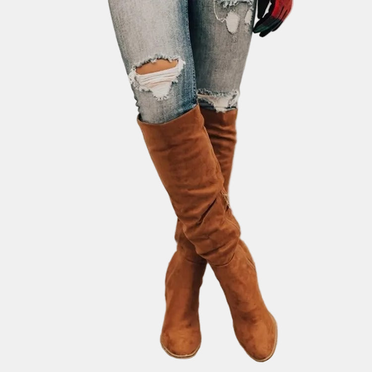 Brown slouchy heeled knee-high boots with stacked block heel and pointed toe