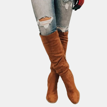 Brown slouchy heeled knee-high boots with stacked block heel and pointed toe
