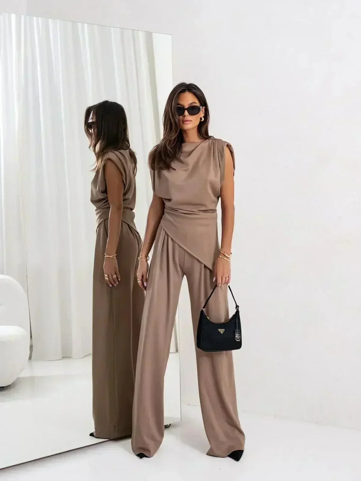 Taupe draped two-piece set with cap sleeves and wide-leg trousers