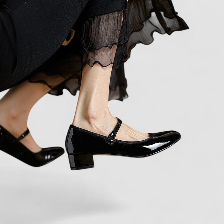 Black Mary Jane shoes with glossy toe and side ankle strap
