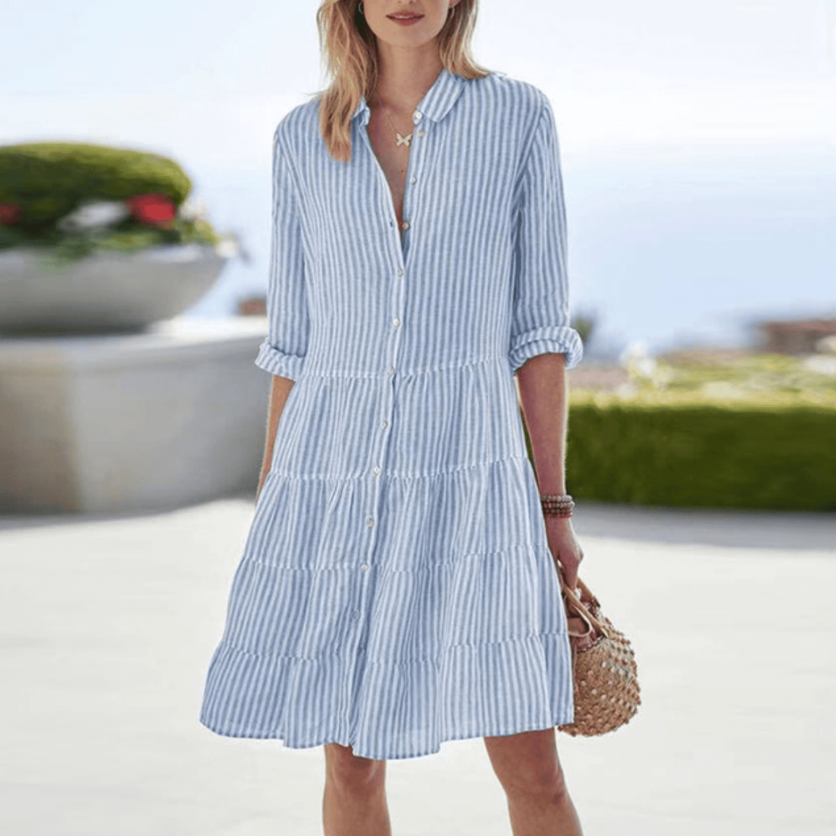 Blue striped tiered shirt dress with button-front placket and 3/4 sleeves