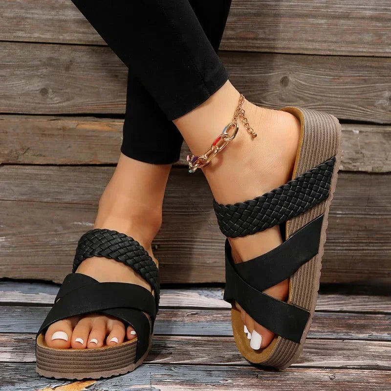 Orthopedic sandals, black woven straps with crisscross bands, cushioned wedge sole