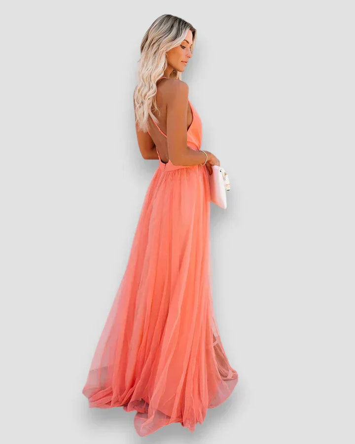 Coral pink maxi dress with open back and crossed halter straps