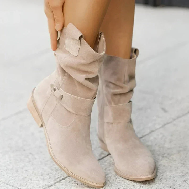 Light beige suede ankle boots with side zipper and low block heel