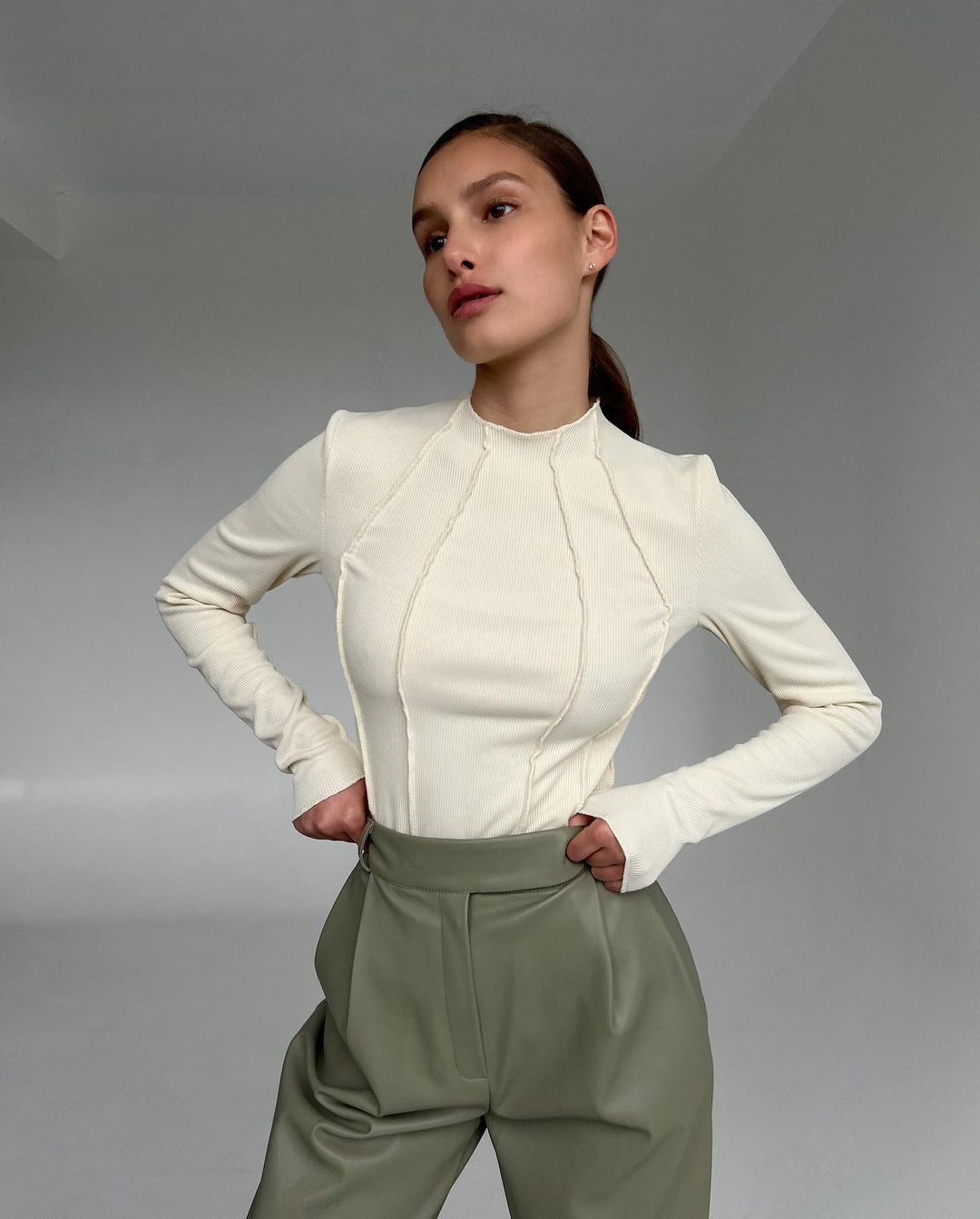 Women’s long sleeve ribbed top in cream with half-zip front