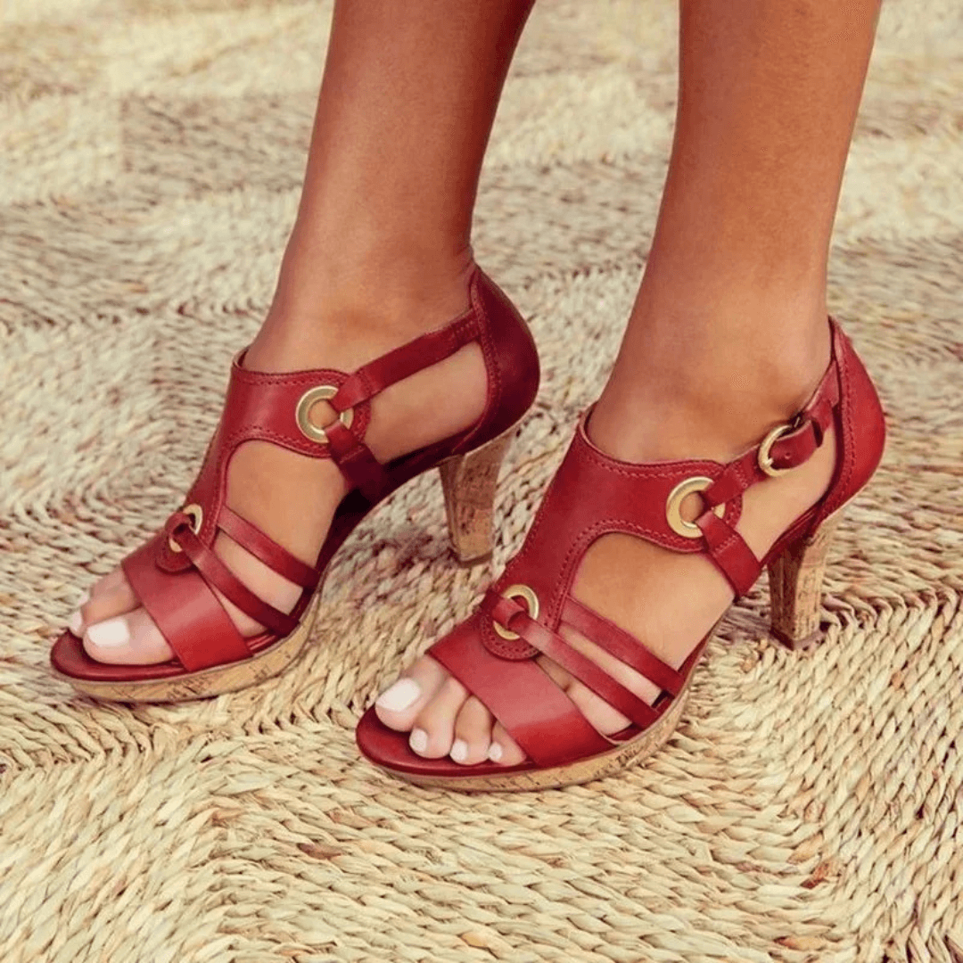 Red strappy heeled sandal with cork sole and gold ring buckles