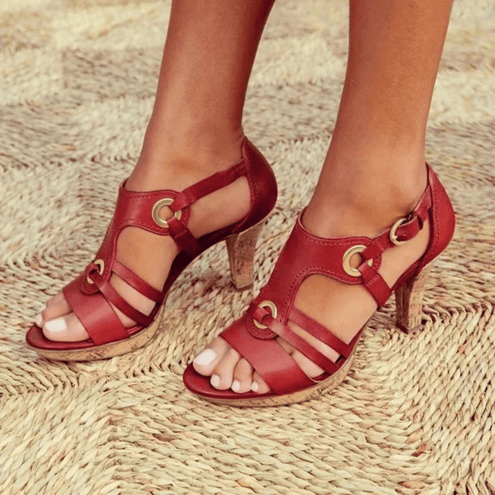 Red strappy heeled sandal with cork sole and gold ring buckles