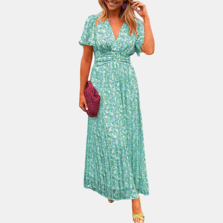 Floral maxi dress with V-neck, short sleeves, and smocked waist in green multicolor